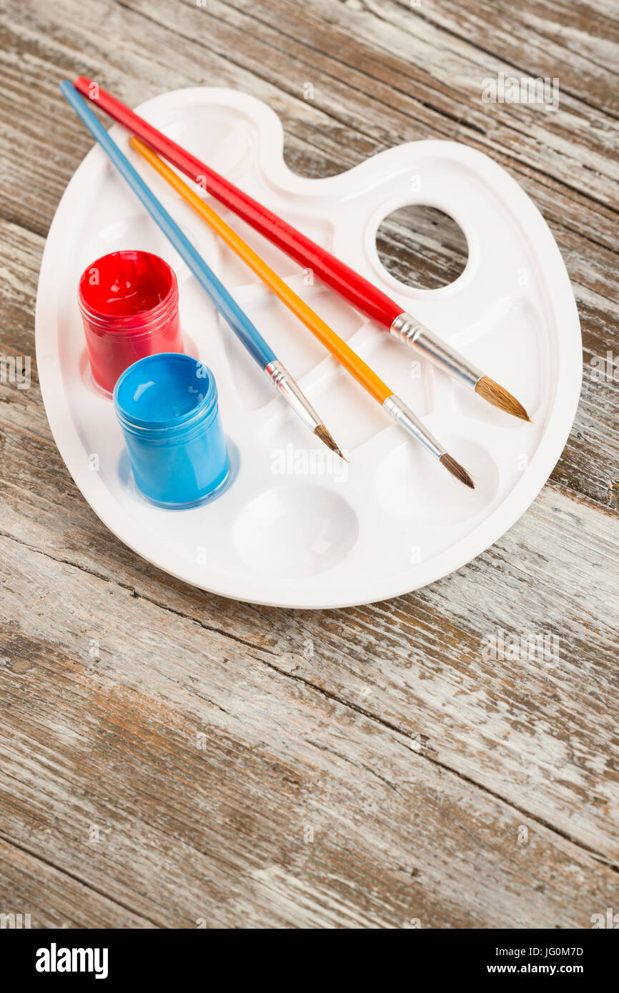 special painting tools on wooden background, education tools for schools Stock Photo