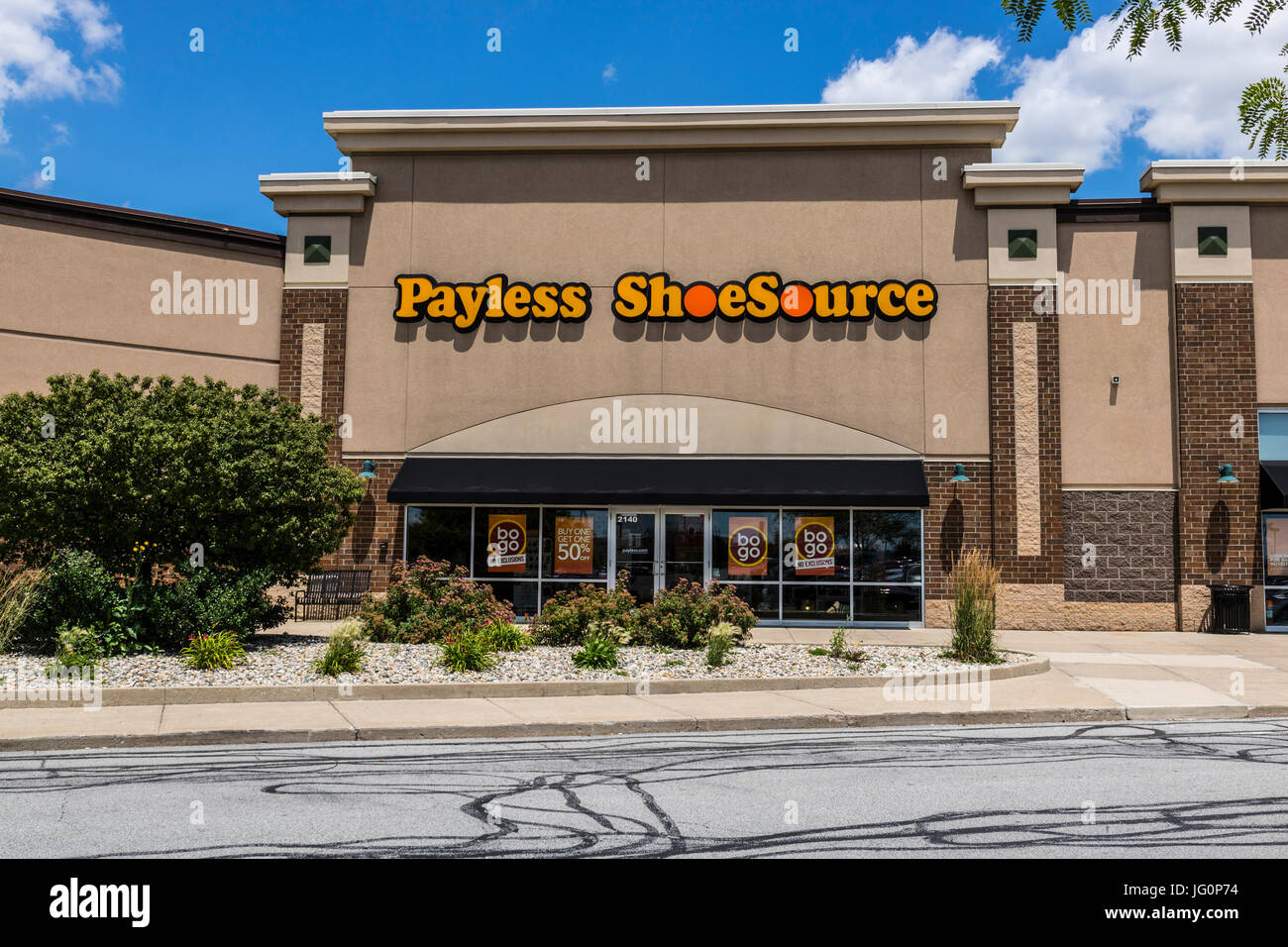 Kokomo - Circa June 2017: Payless ShoeSource Retail Strip Mall Location. Payless ShoeSource sells shoes at a discount and is privately held by Blum Ca Stock Photo