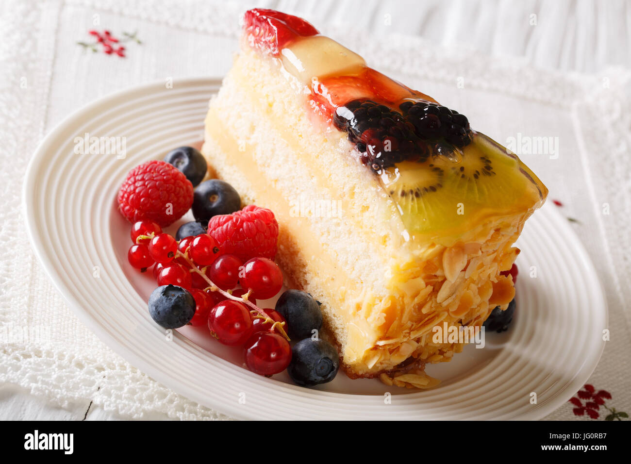 Homemade fruit berry cake closeup on a plate on a table. horizontal Stock Photo