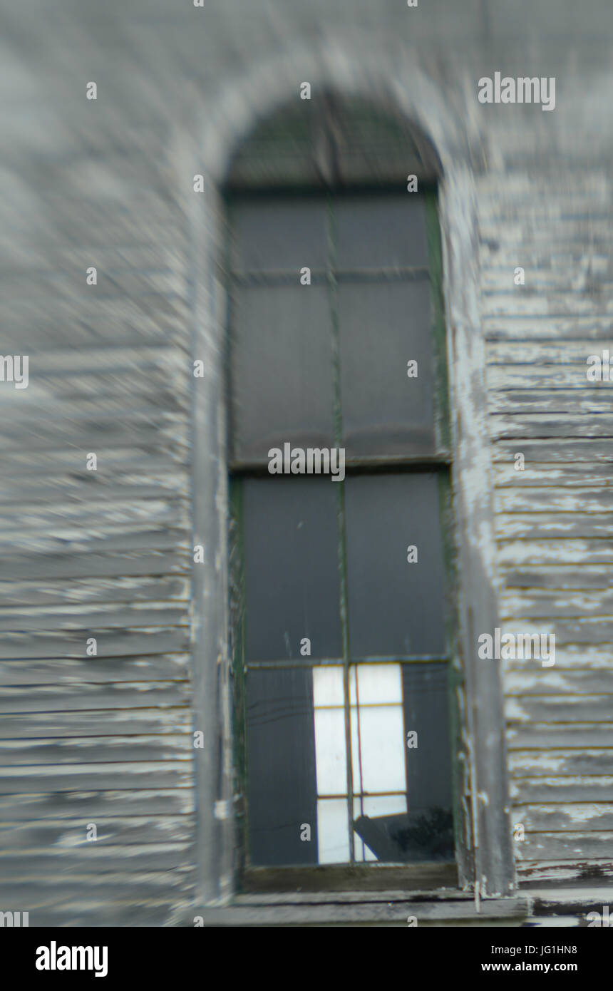 broken glass windows in old abandoned building Stock Photo - Alamy