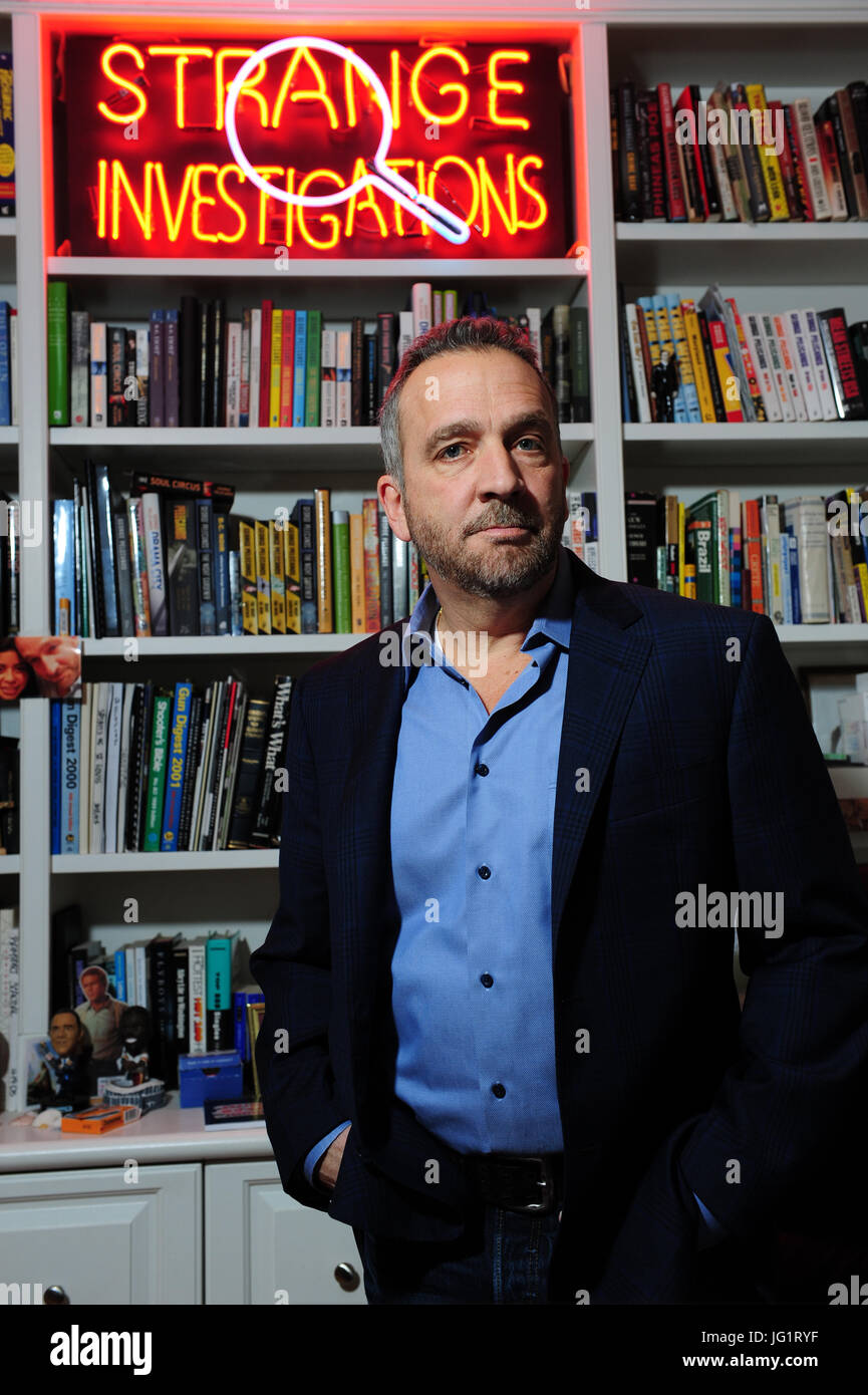 George Pelecanos in his home in Maryland Author writer TV director crime mystery Stock Photo