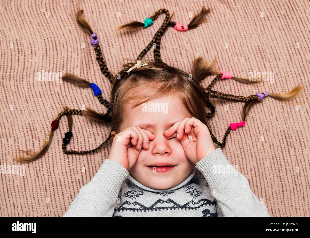 Close-up portrait of little child girl with hair braids Stock Photo - Alamy