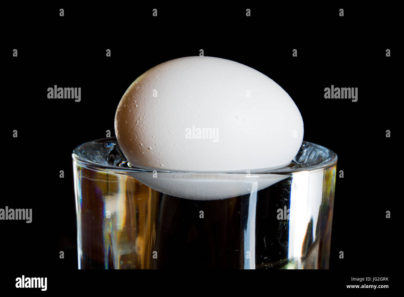 Egg floating in glass water hires stock photography and images Alamy