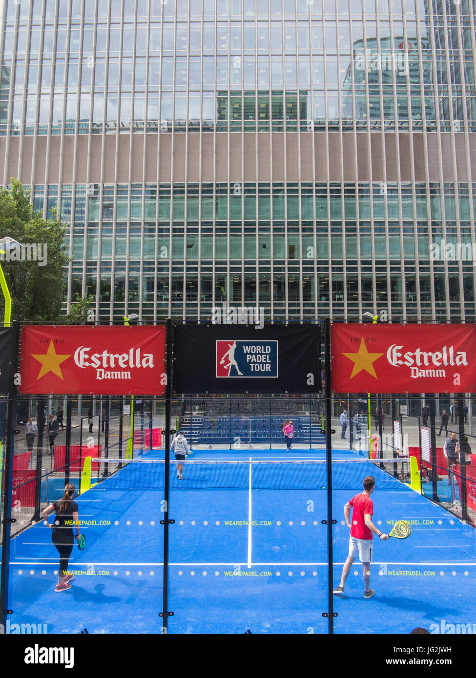 Padel tennis in the Docklands area of London, surrounded by high rise offices Stock Photo