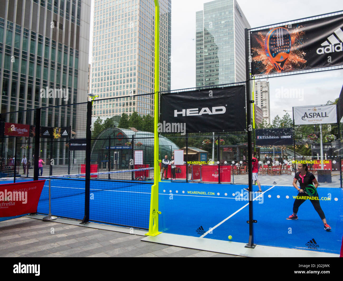 Padel tennis in the Docklands area of London, surrounded by high rise  offices Stock Photo - Alamy