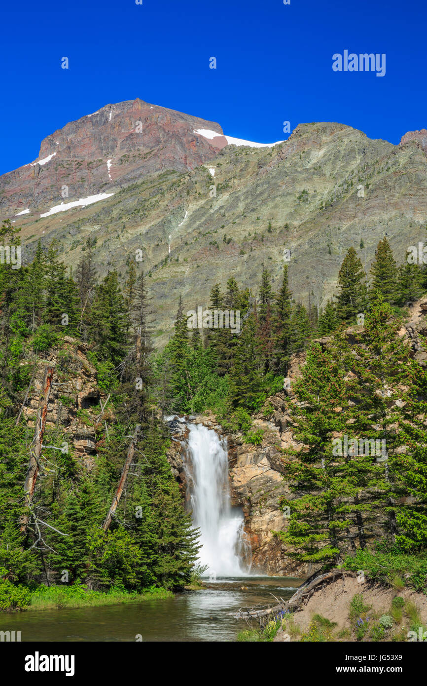 running eagle (trick) falls below rising wolf mountain in glacier national park, montana Stock Photo