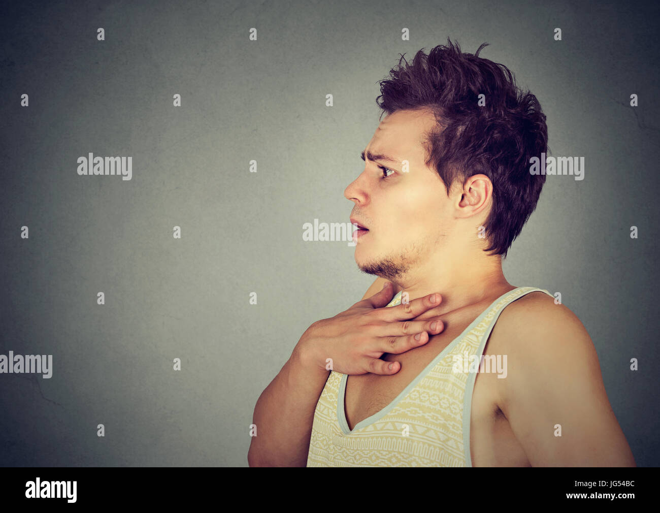 Portrait of a scared anxious young man Stock Photo