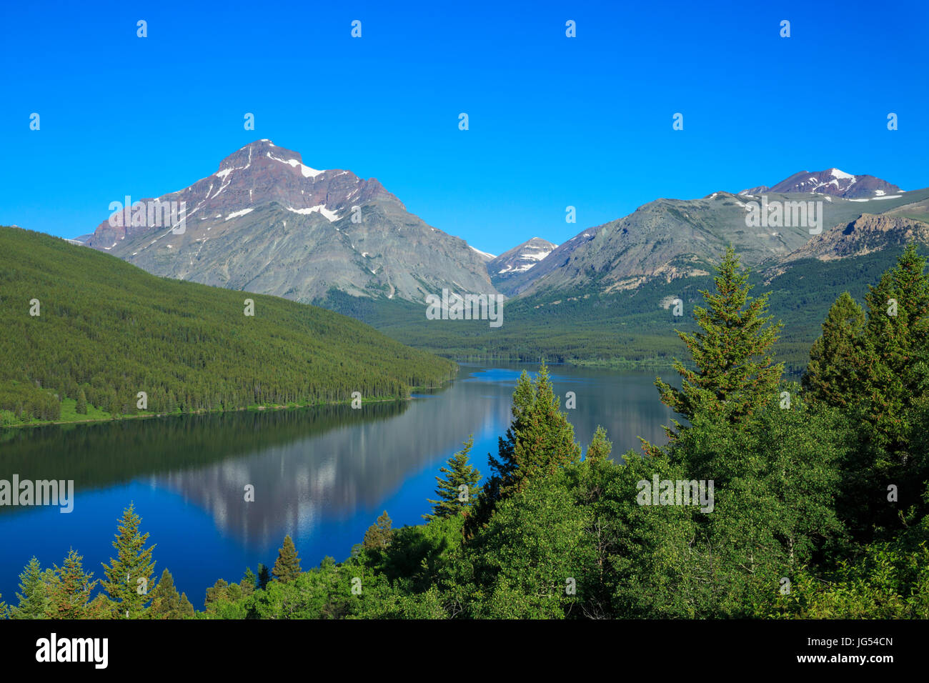 lower two medicine lake below rising wolf mountain in glacier national park, montana Stock Photo