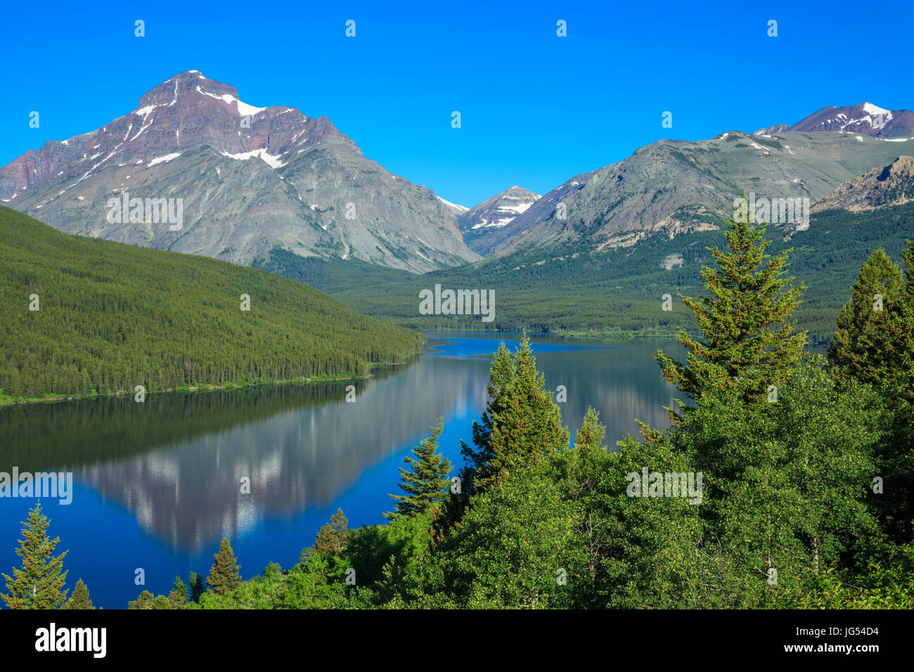 lower two medicine lake below rising wolf mountain in glacier national