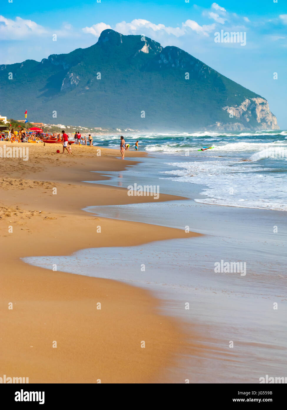 The Beach at Sabaudia, Latina, Lazio, Italy. A beautiful beach ideal for families. The beach is filled with umbrellas and parasols for hotel guests. Stock Photo