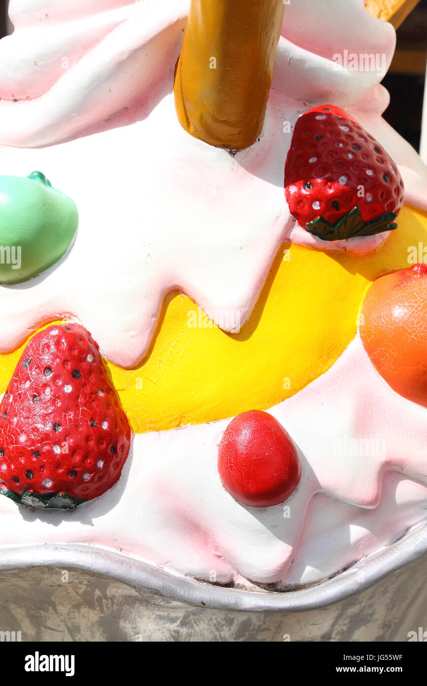 Close-up of a large plastic model of a fruit sundae outside a sweet shop Stock Photo