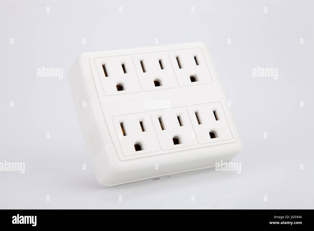 White multiple electric socket adapter isolated on white background