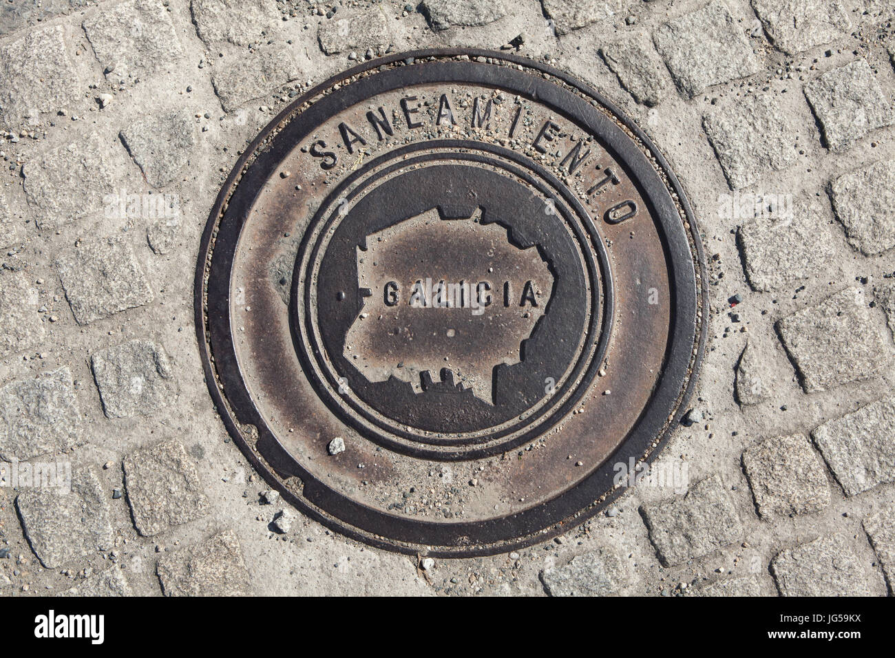 Map of Galicia depicted on the manhole cover in Santiago de Compostela, Galicia, Spain. Stock Photo
