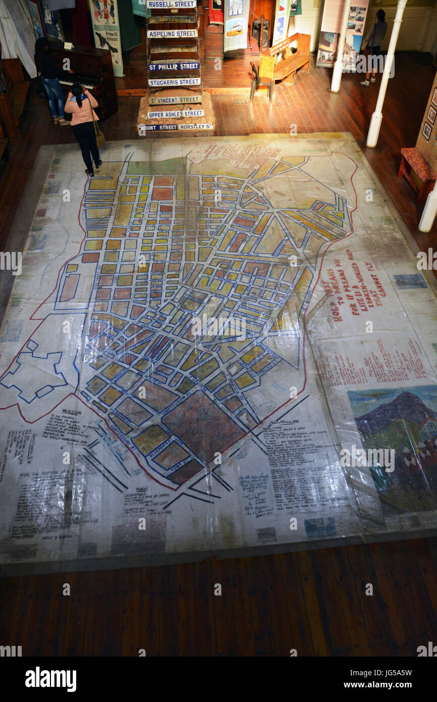 Main floor of the District Six Museum has a neighborhood floor map and other artifacts before residents were forcibly removed by the government. Stock Photo