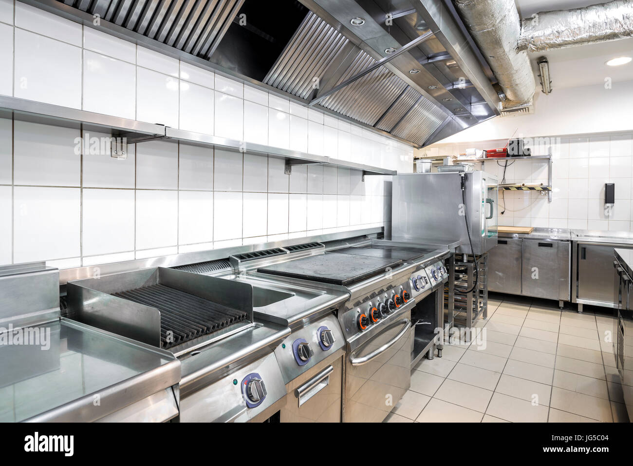 Modern kitchen in the restaurant with stainless equipment Stock Photo