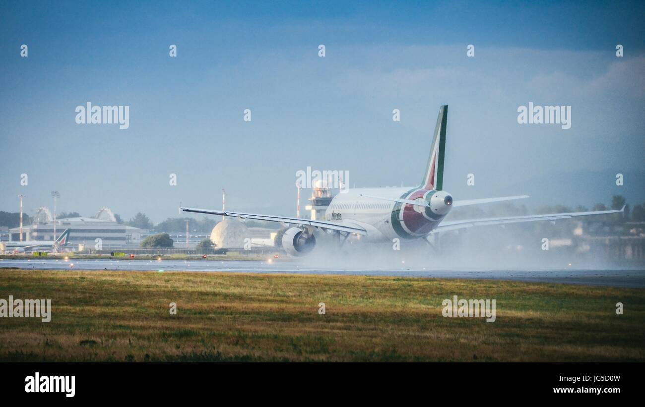 An Alitalia commercial airplane takes off from Milan's Linate airport ...