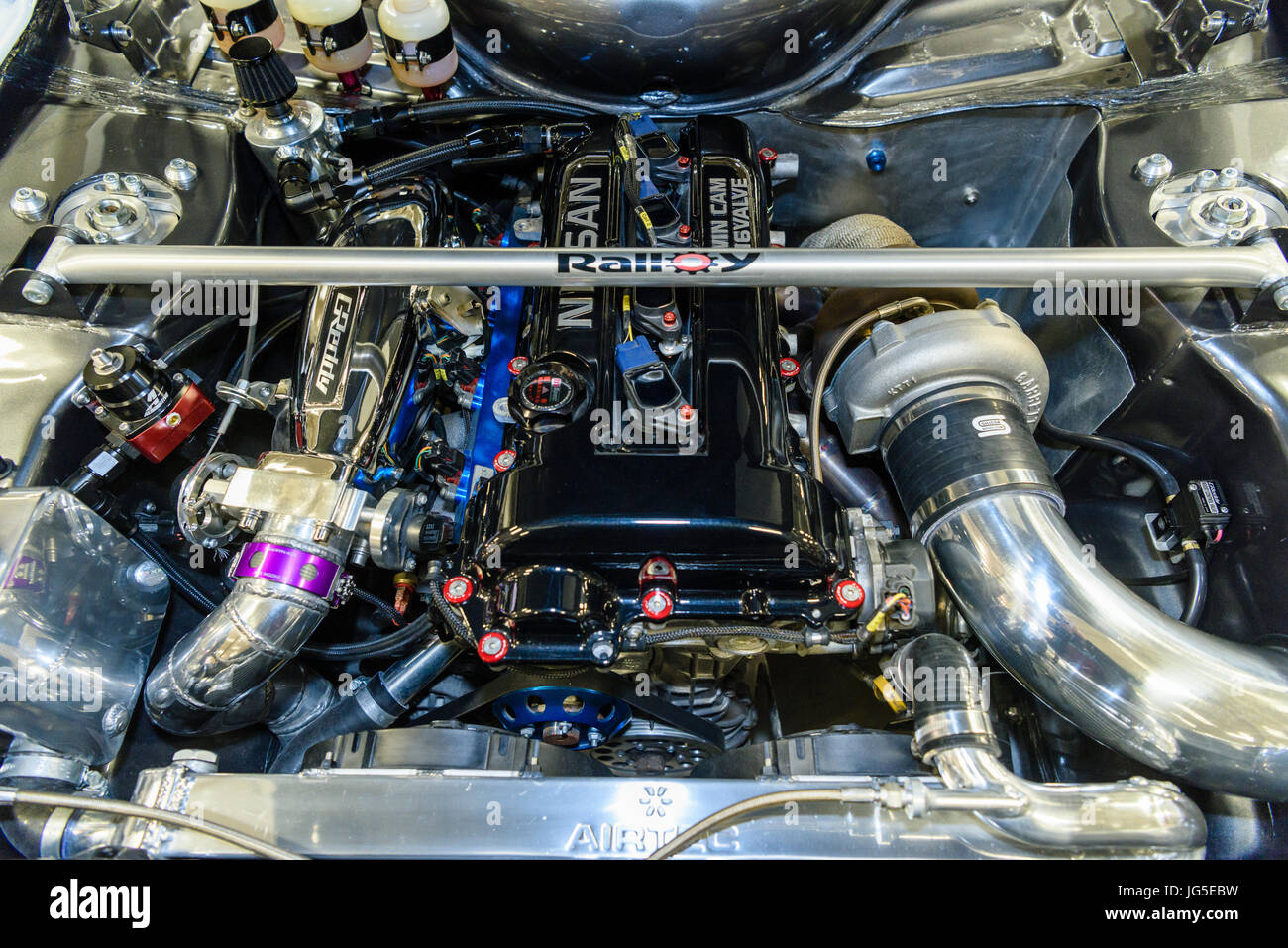 Nissan Twin Cam 16 valve engine, very clean, with supercharger and rollbar  in a modified custom car Stock Photo - Alamy