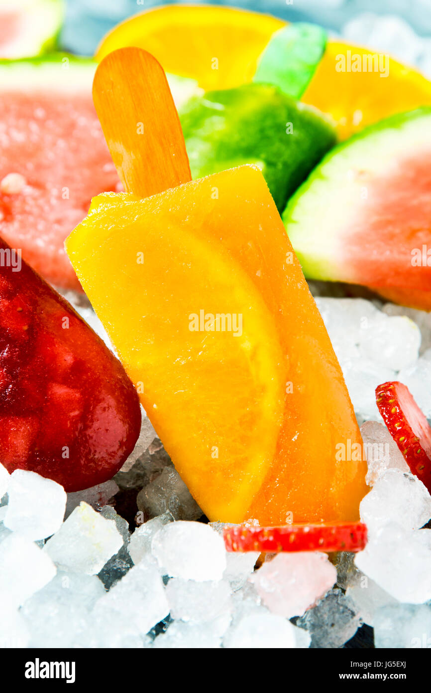some different homemade natural ice pops made with natural fruit juices