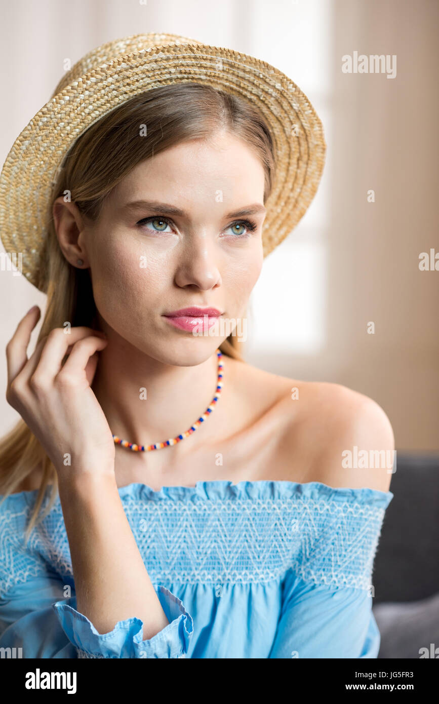 close up portrait of beautiful young woman in straw hat Stock Photo - Alamy