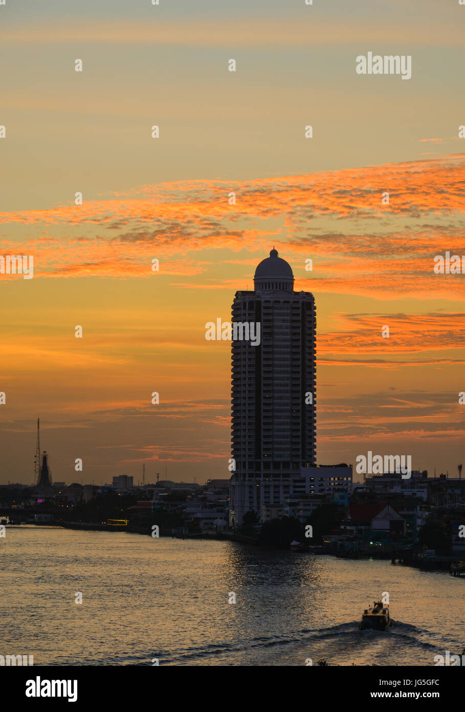 Chao Phraya River at sunset in Bangkok, Thailand. Bangkok is the ...