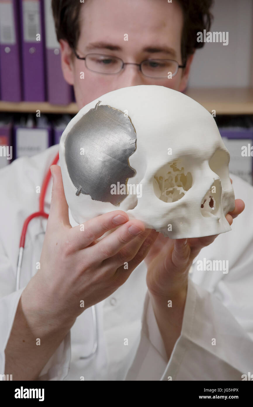 Metal plate for a specific cranial repair produced by  Direct Metal Laser Sintering (DMLS) process. Stock Photo