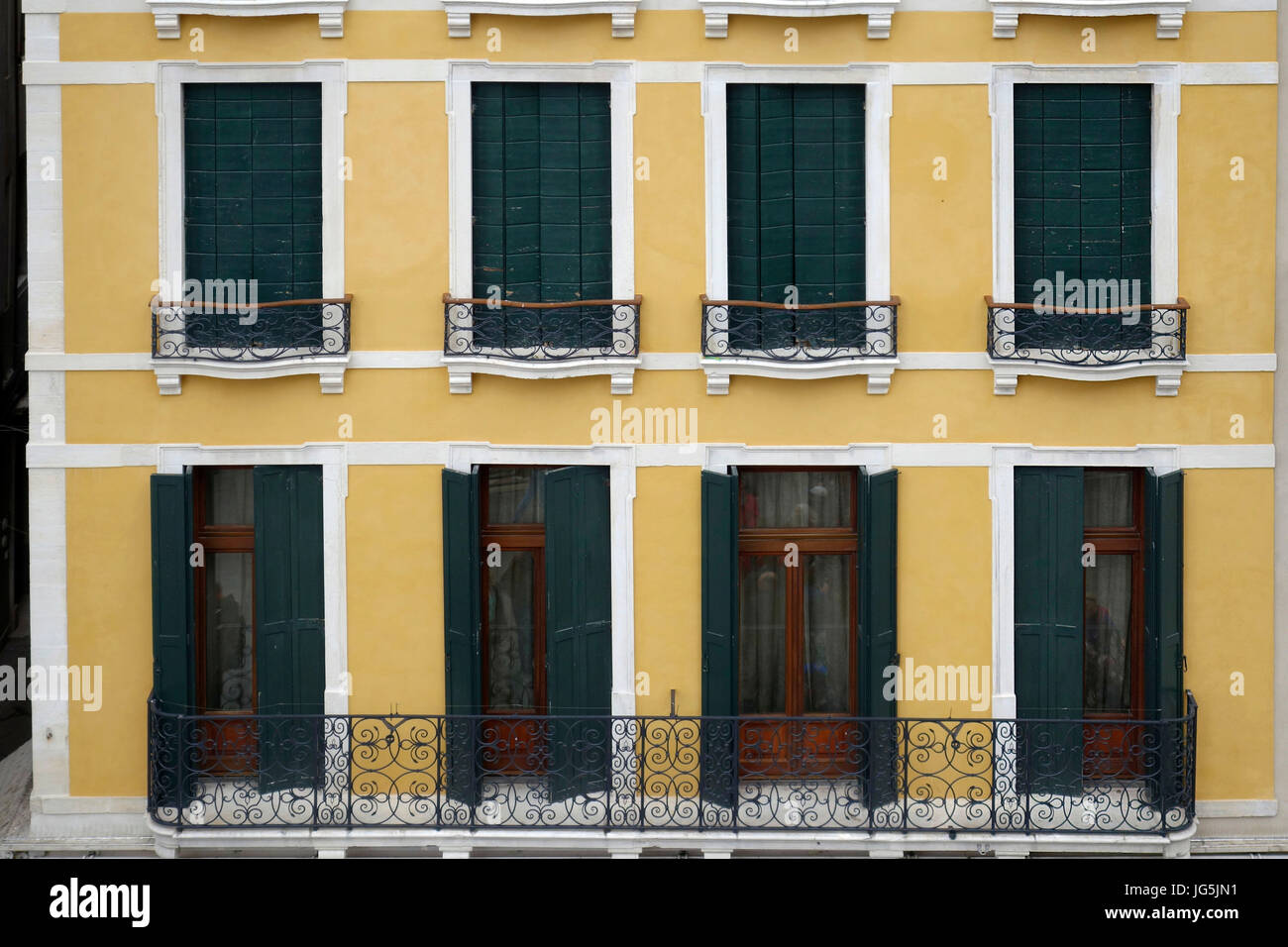 Shuttered windows that overlook St. Marks Square, Venice, Italy Stock Photo
