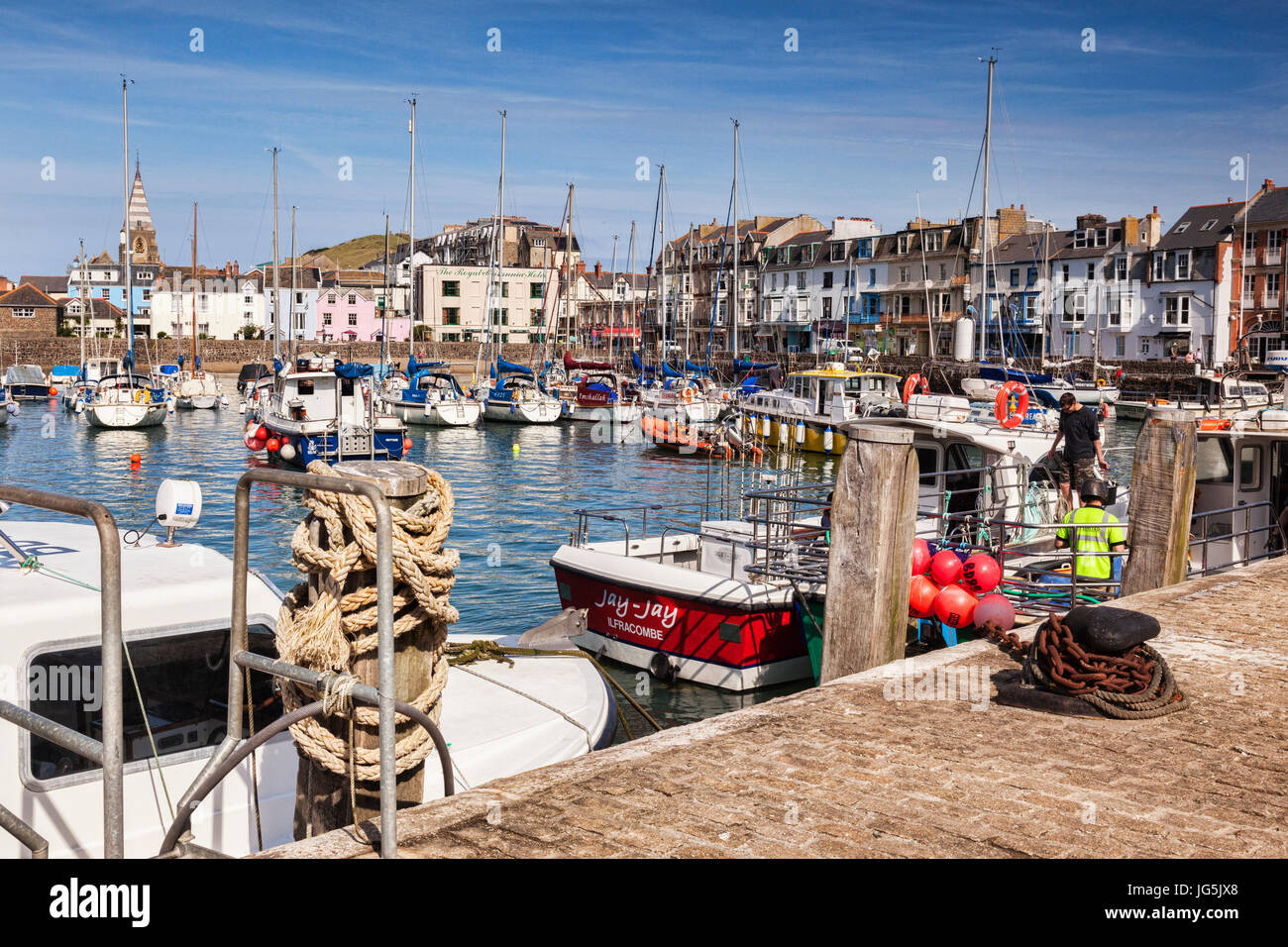 14 June 2017: Ilfracombe, Devon, England, UK - The busy harbour and quay on a warm summer day. Stock Photo