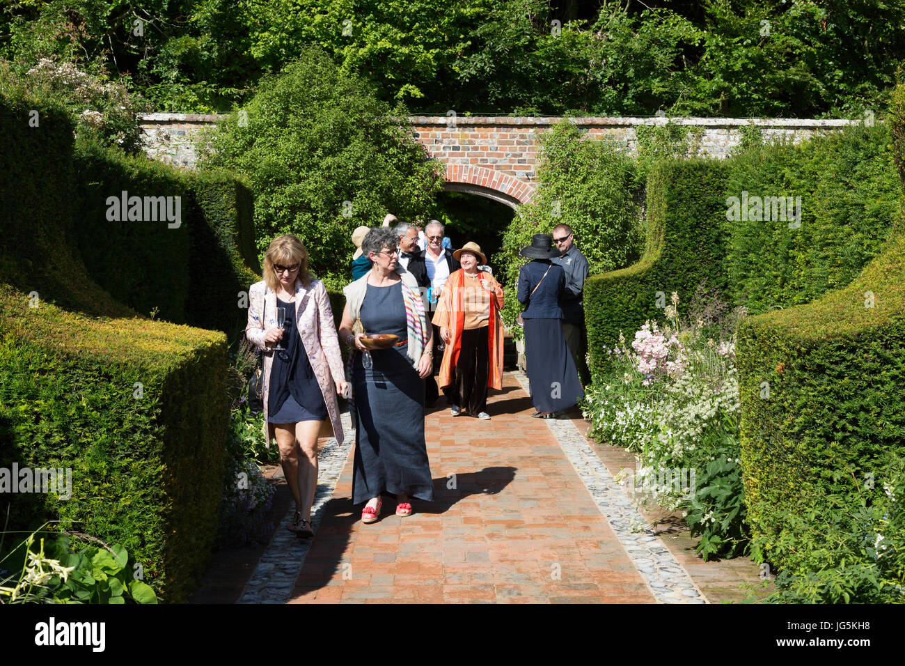 Garsington Opera - people looking at the gardens, Wormsley Park Estate, owned by the Getty Family,  Stokenchurch, Buckinghamshire England UK Stock Photo