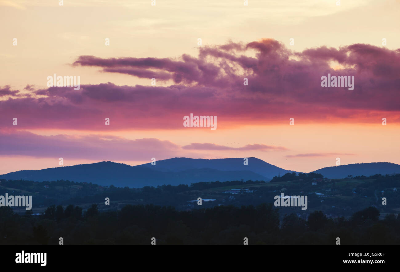 Sunset over Island Beskids (Beskid Wyspowy) mountains in southern Poland, taken in Nowy Sącz Stock Photo
