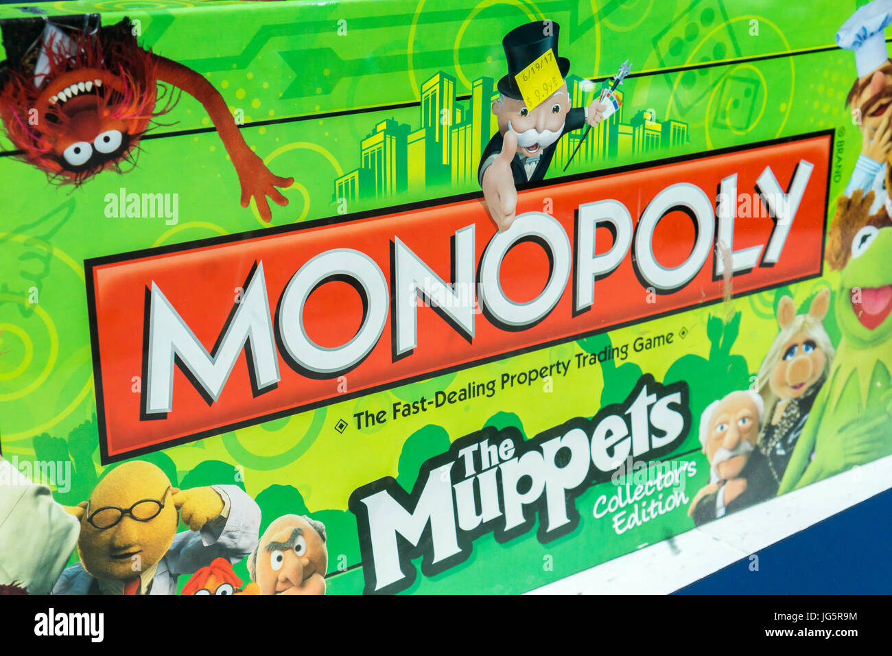 Thematic 'Muppets' version of the famous Monopoly board game seen in a second-hand store in New York on Wednesday, June 28, 2017. The depression-era game was first sold commercially in 1935 by Parker Brothers and is now owned by Hasbro which acquired parker Brothers in 1991. (© Richard B. Levine) Stock Photo