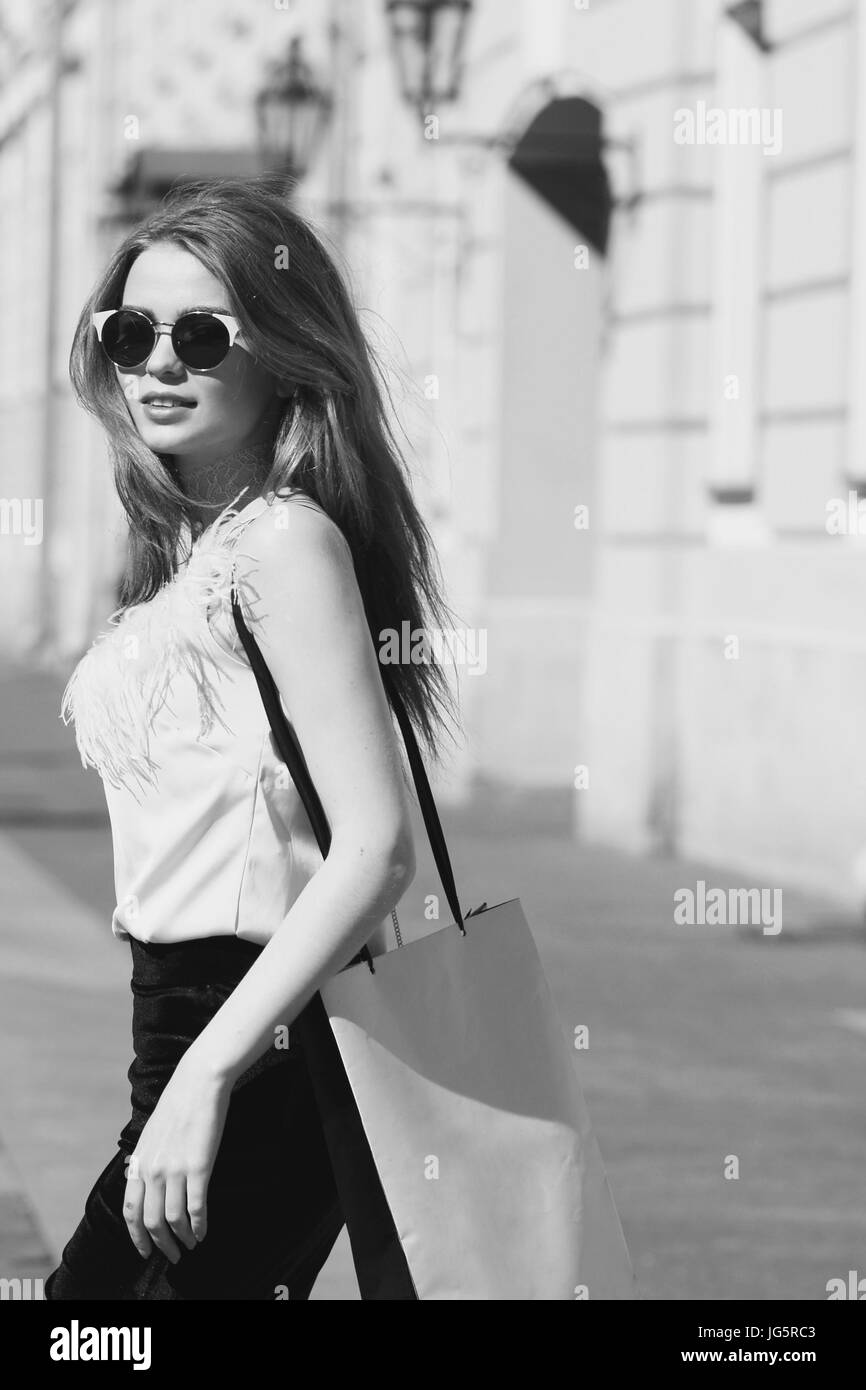 Stylish girl with shopping bag Stock Photo