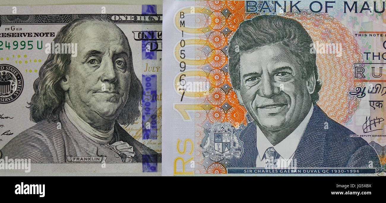 Portraits on banknotes. US 100 dollar bill and Mauritius 1000 rupee bill. Stock Photo