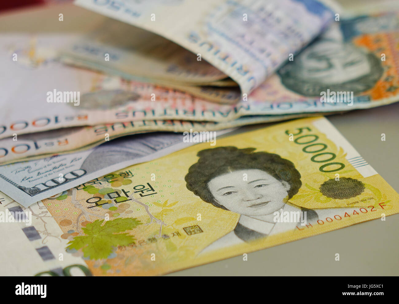 Portraits on banknotes. Korea 50,000 won bill. Shallow DOF. Stock Photo