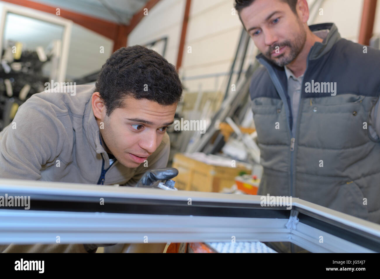 drilling into a door frame Stock Photo Alamy