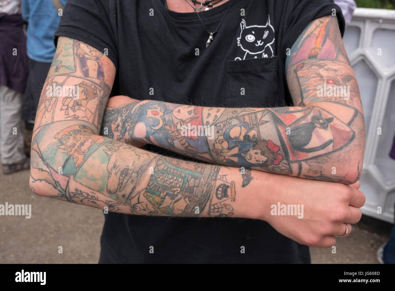 A Woman Showing Her Tattoos At The Historic Narrowboat Rally At Braunston Marina Braunston Northamptonshire Stock Photo Alamy