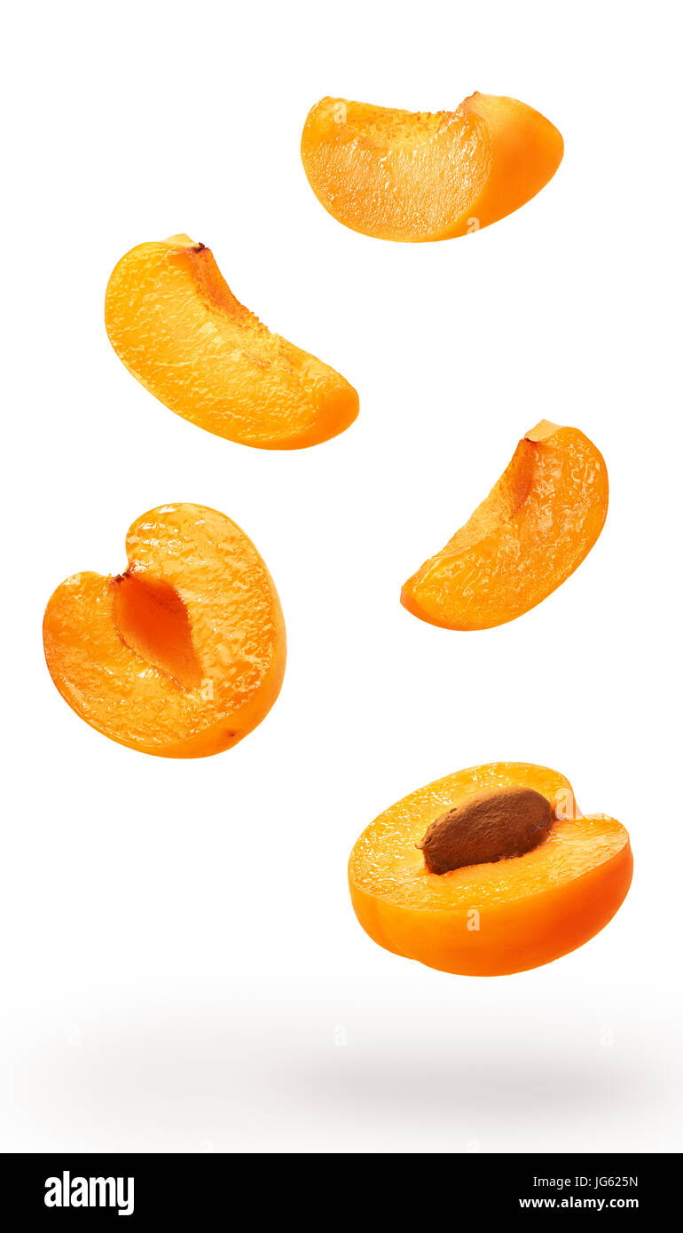 Collection of cut apricot fruits isolated on white background Stock Photo Alamy