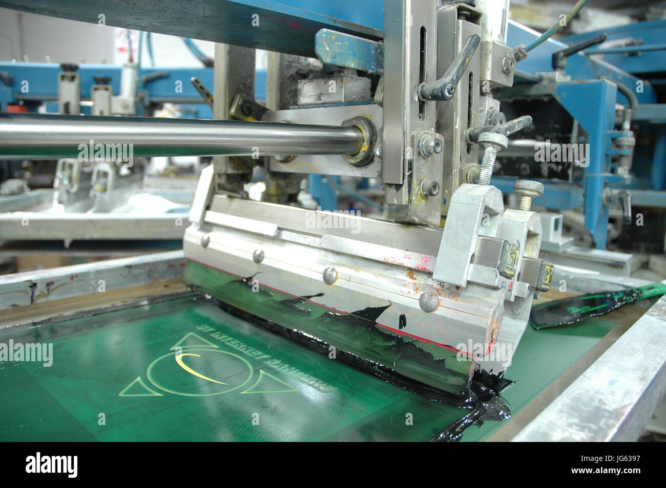 Automatic industrial screen printing machine branding t shirt garment  printer Stock Photo - Alamy