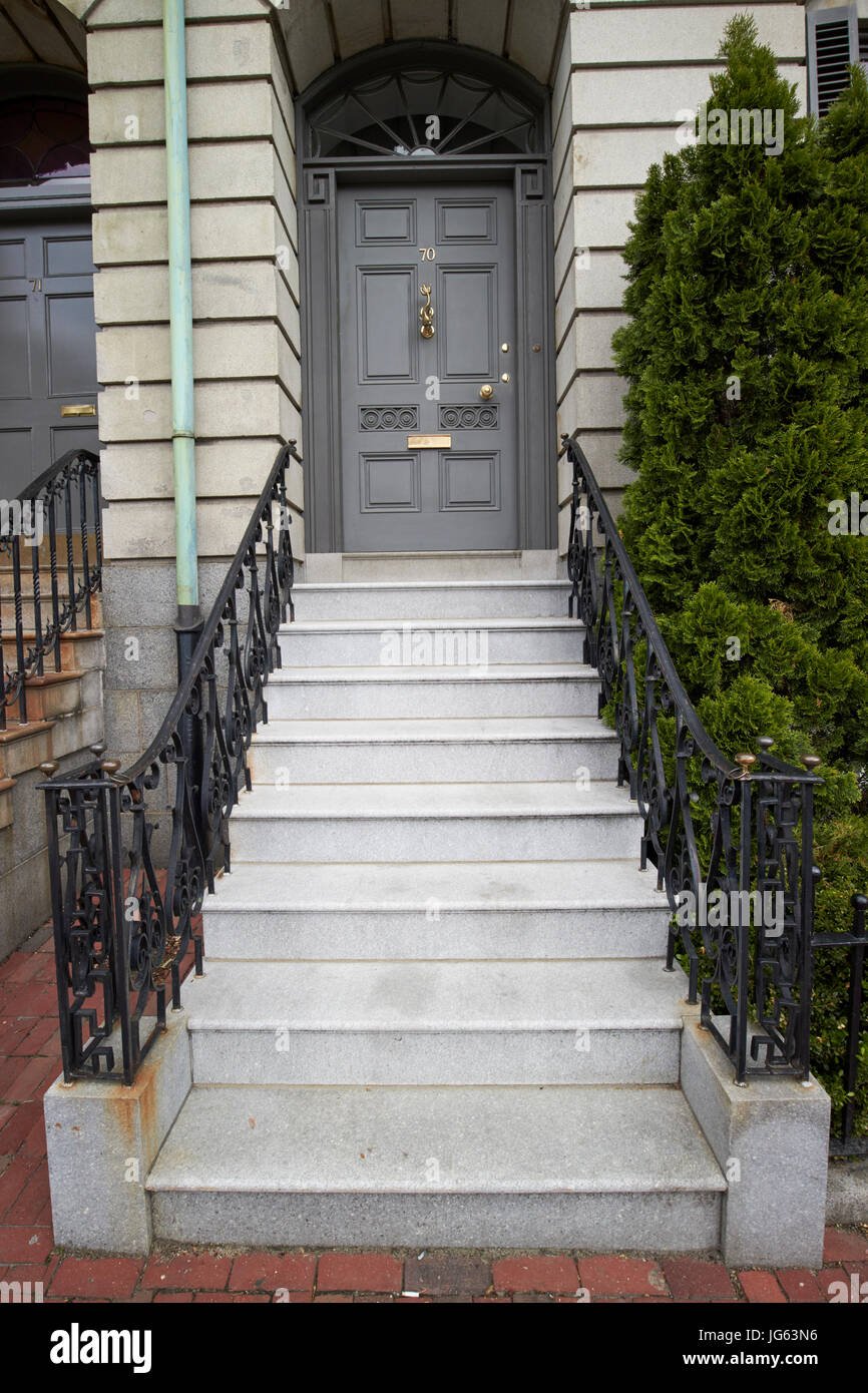 steps up to a grey doored townhouse in central Boston USA Stock Photo