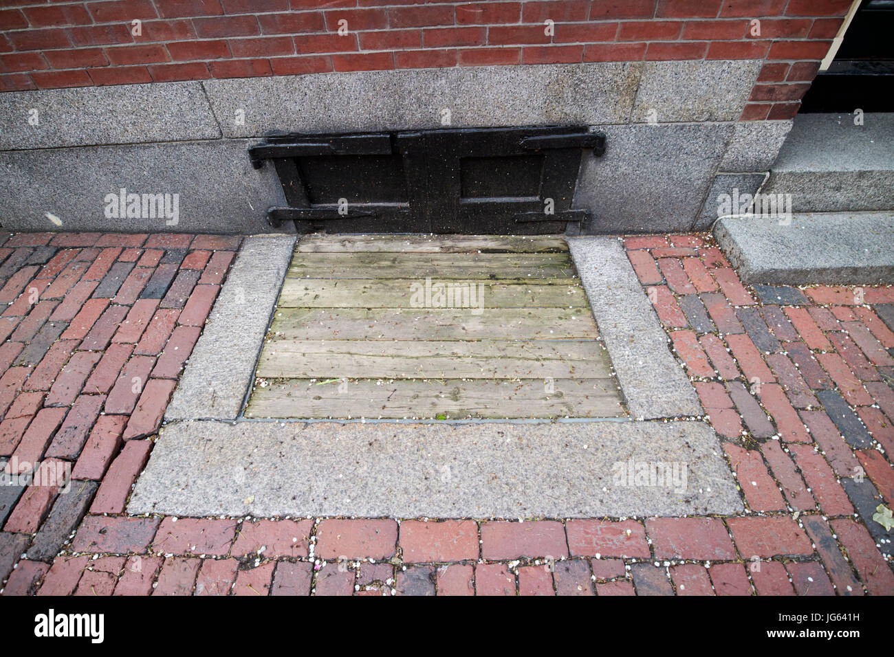 wooden covered basement access in sidewalk historic beacon hill Boston USA Stock Photo