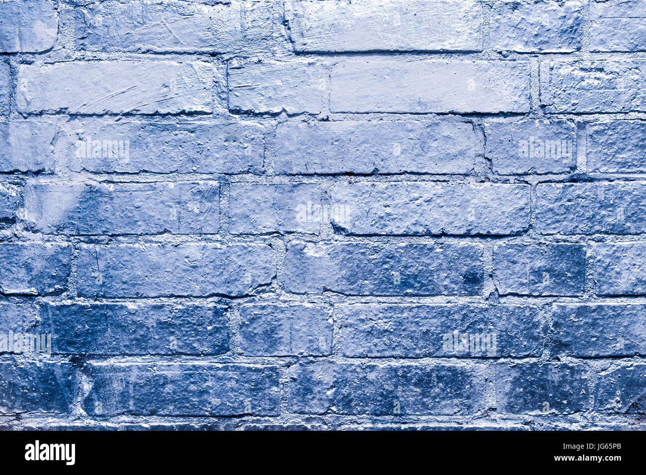 brick  wall  with blue, silver colored paint Stock Photo