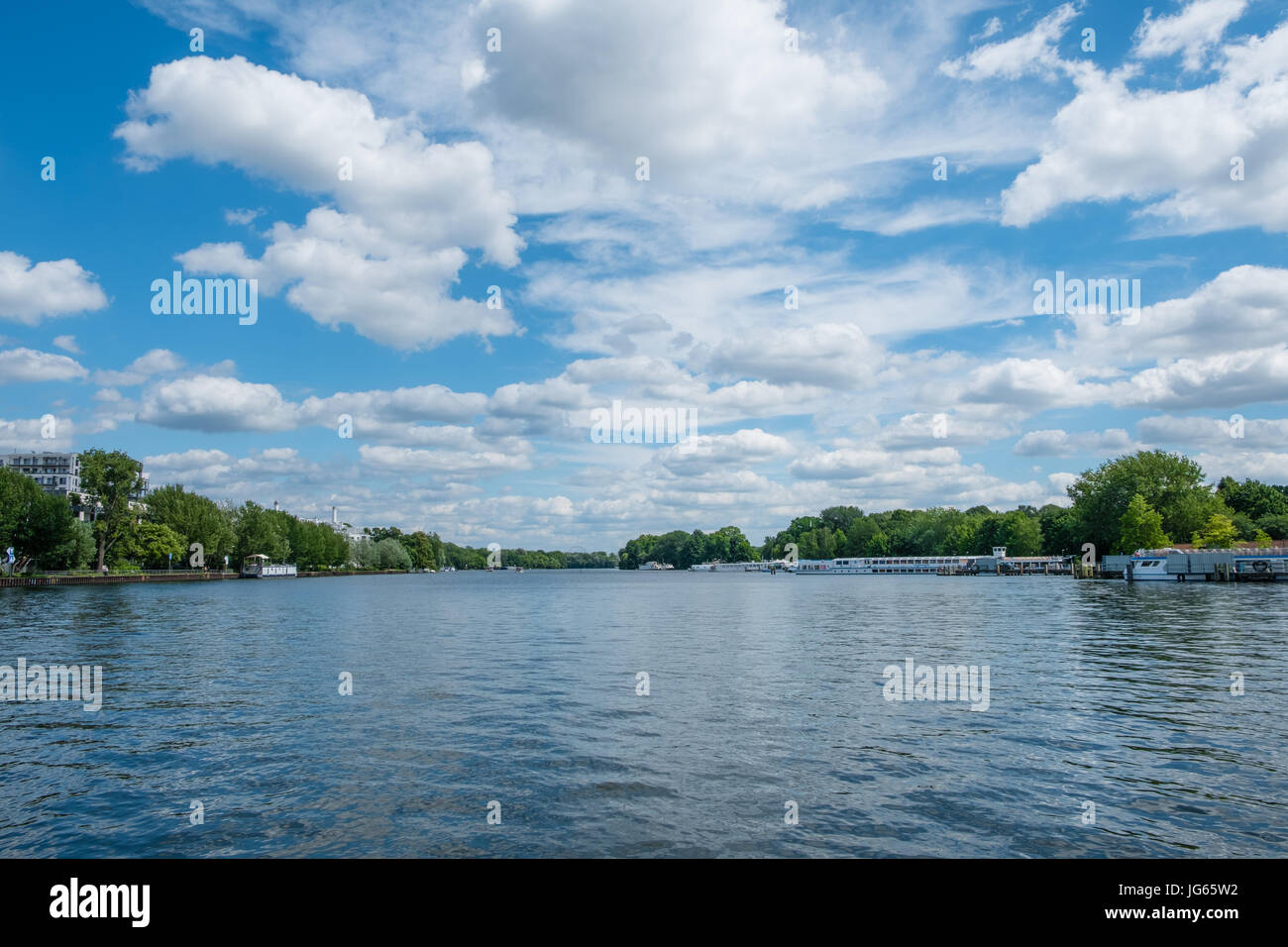 lake landscape , river spree with tour boats and beautiful sky and clouds Stock Photo