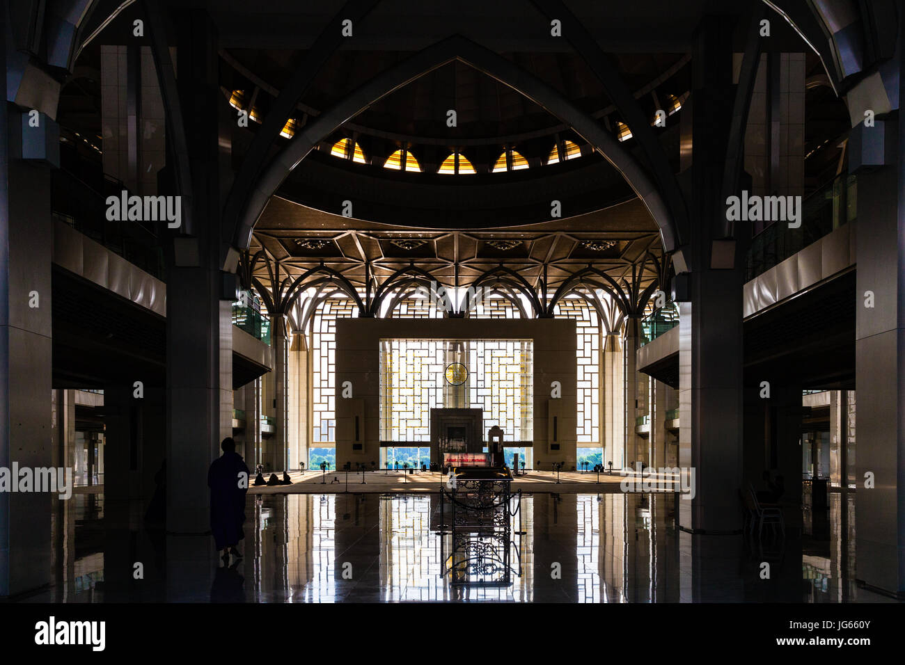 Putrajaya, Malaysia - August 11, 2016: Woman going to the mosque to pray on August 11, 2016 in Putrajaya, Malaysia. Stock Photo