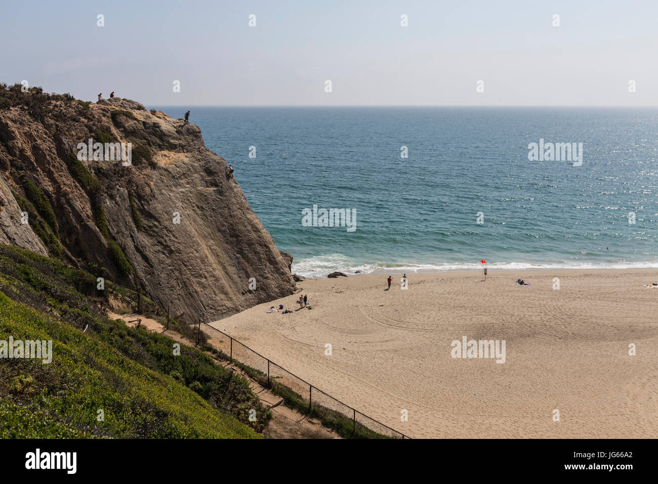 Malibu, California, USA - June 29, 2017:  View of rock climbing cliff at Westward Beach in Point Dume State Park. Stock Photo