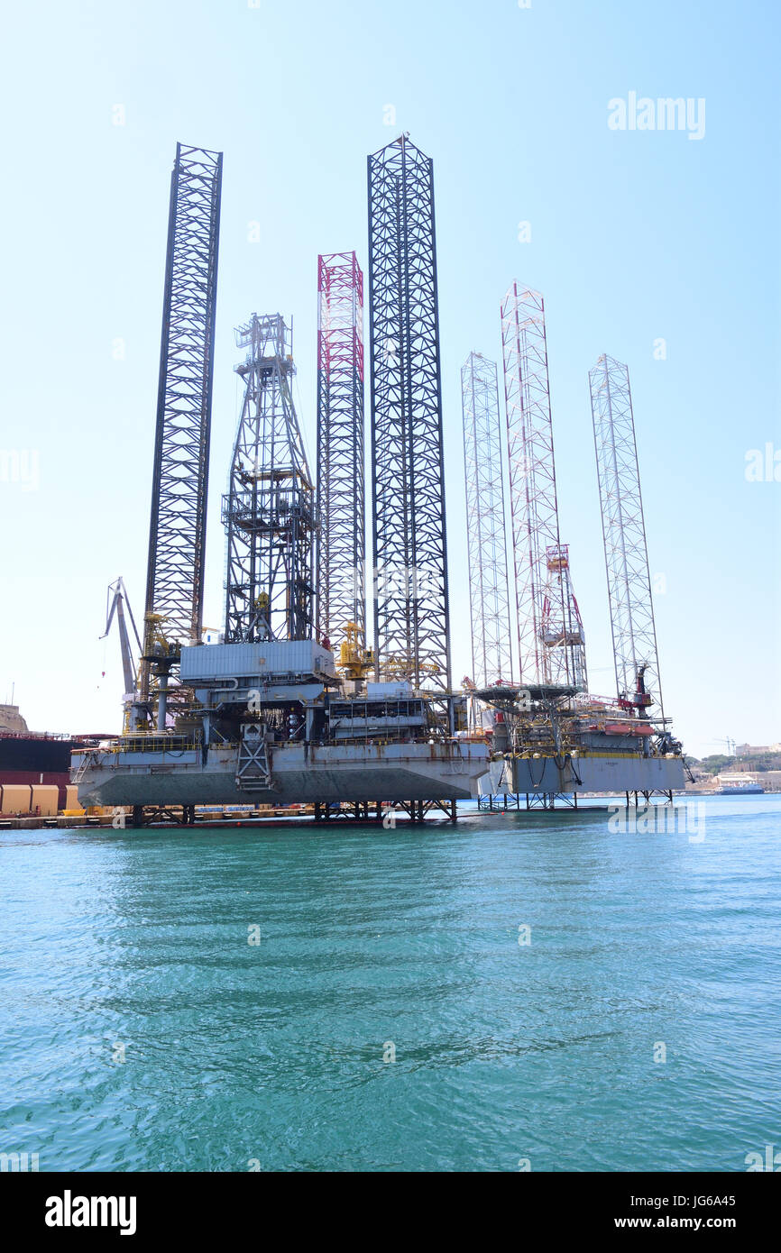 Ocean going Oil Drilling Rig moored in Harbor, Valletta Malta Stock Photo
