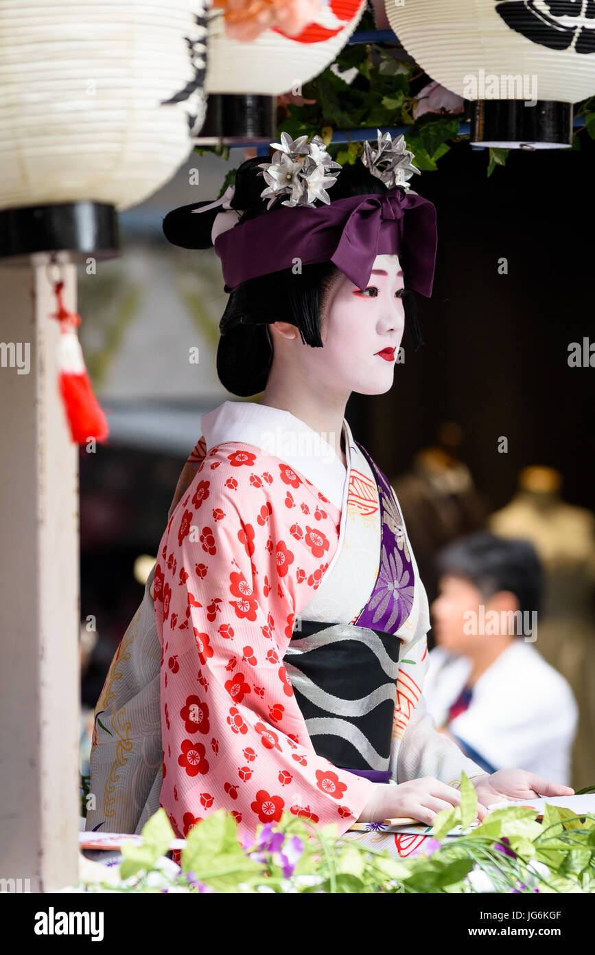 Geisha in traditional clothing. Kyoto, Gion Matsuri Festival processions of floats with Geisha. One of the most famous festival in Japan. Stock Photo