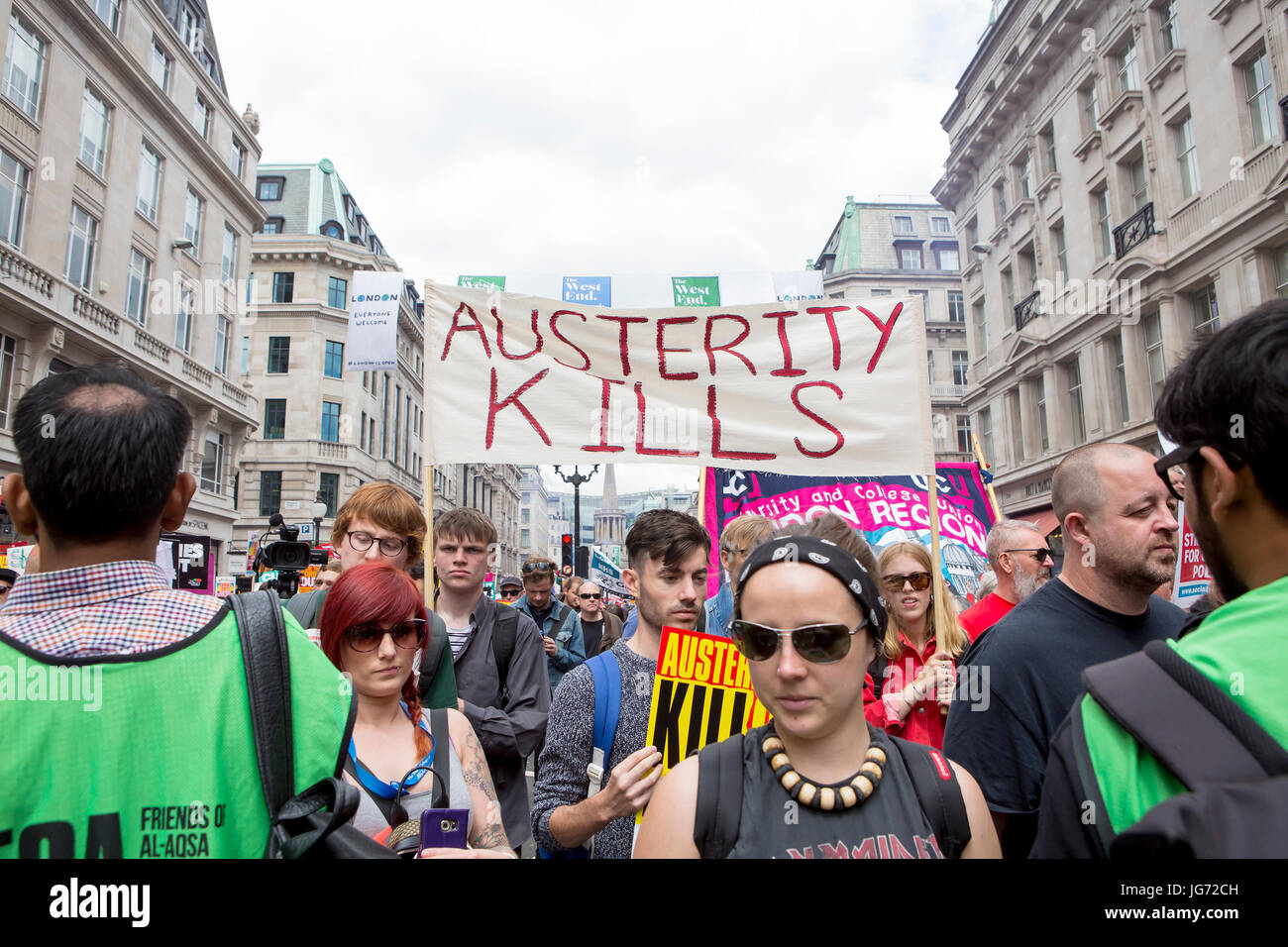 London, United KIngdom - July 1, 2017: Austerity Kills. A march was held in the centre of London to protest the government's continuing austerity meas Stock Photo
