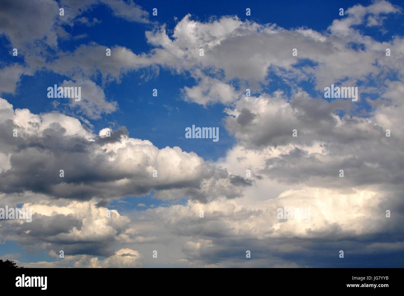 Dark and Stormy Clouds with Blue Sky Stock Photo - Alamy