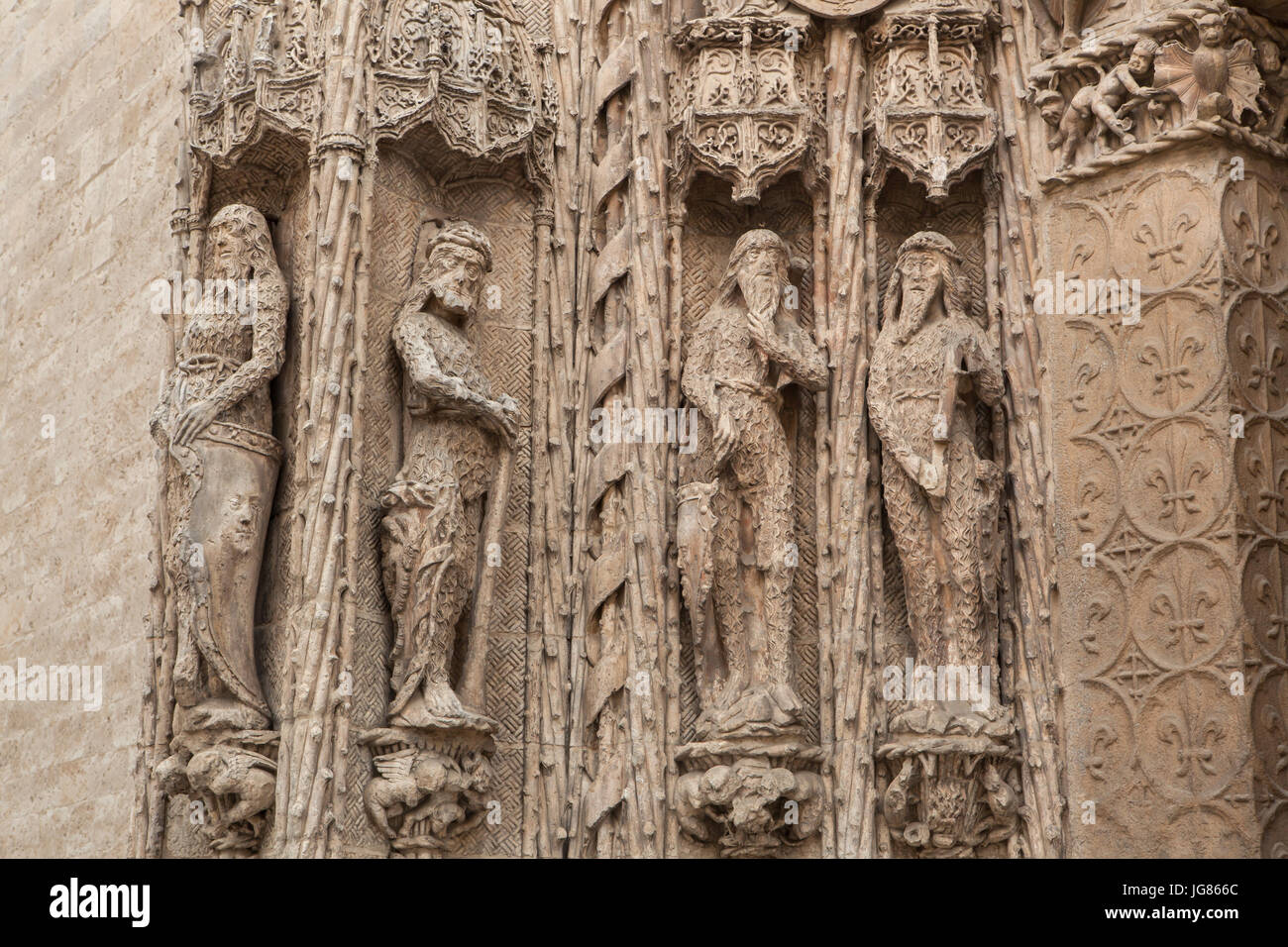 Savage men depicted on the main facade of the Colegio de San Gregorio in Isabelline style, now housing the National Museum of Sculpture (Museo Nacional de Escultura) in Valladolid in Castile and León, Spain. Stock Photo