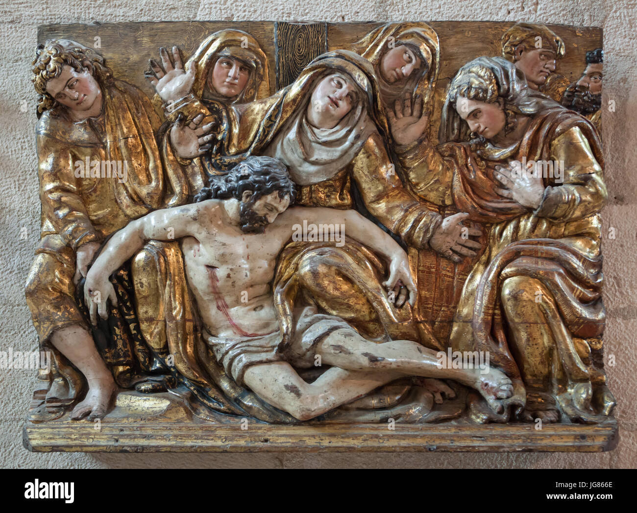 Lamentation of Christ. Polychrome wooden panel from the 16th century attributed to Spanish sculptor Francisco de la Maza on display in the Diocesan and Cathedral Museum (Museo Diocesano y Catedralicio de Valladolid) in Valladolid in Castile and León, Spain. Stock Photo