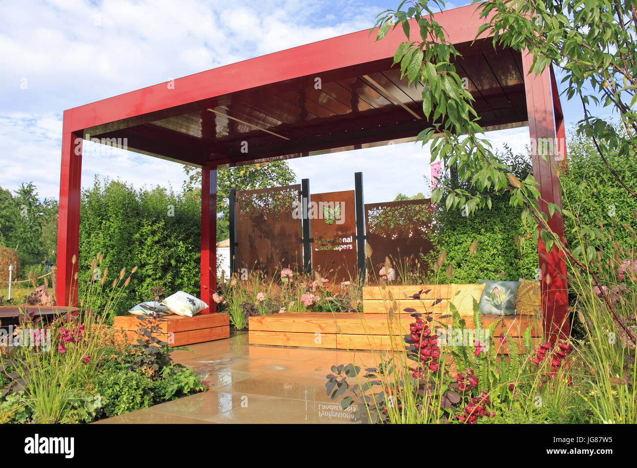 Association of Professional Landscapers 'A Place to Meet'. Feature Garden. RHS Hampton Court Palace Flower Show, London, England, UK. Press Preview Day, 3rd July 2017. Annual Flower Show organised by the Royal Horticultural Society. Show runs from Tuesday 4th July until Sunday 9th July 2017. Ian Bottle / Alamy Live News Stock Photo